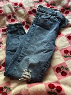Levi's Medium Blue Women's Skinny Jeans with Knee Distress